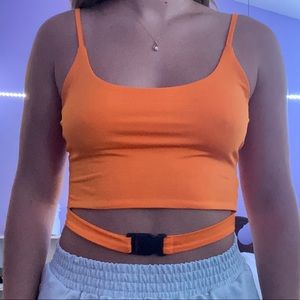 Orange buckle crop top